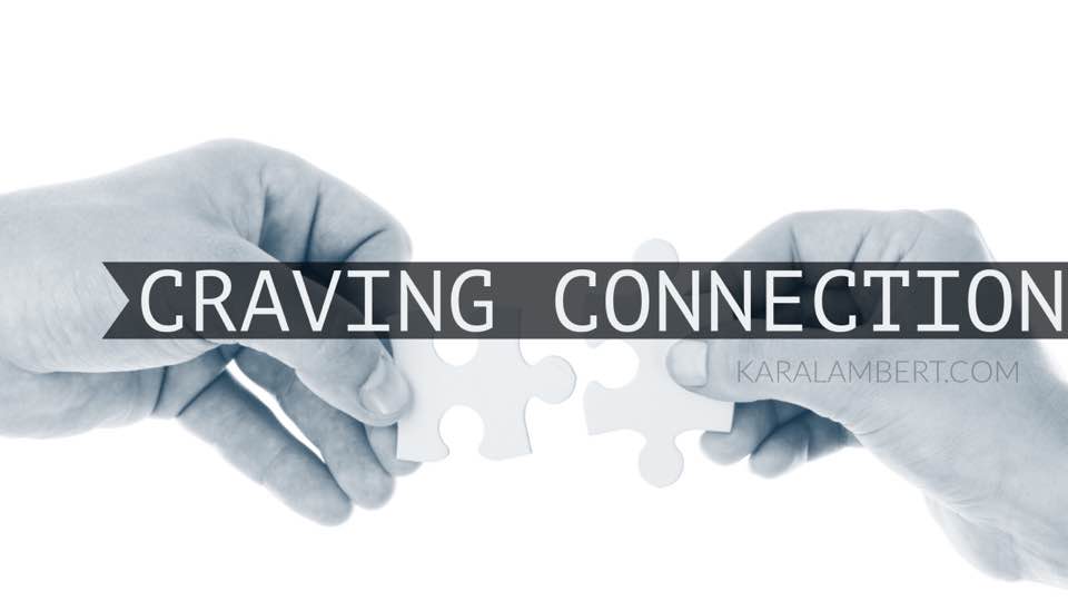 Two hands holding a puzzle piece depicting the significant role of craving connection in business psychology.