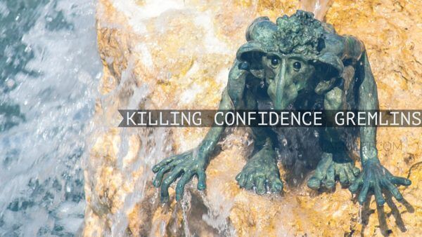 A business psychology statue visually representing the concept of "killing confidence gremlins.