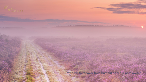 A misty sunrise over a field of purple flowers offers a serene and rejuvenating view, fostering a peaceful environment to recover from burnout.